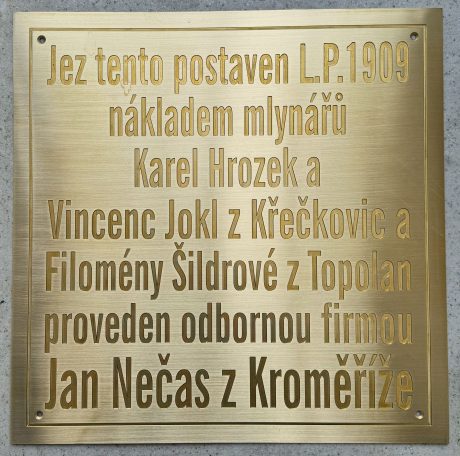 realizace - Mosazná pamětní tabule na Jezu z roku 1909